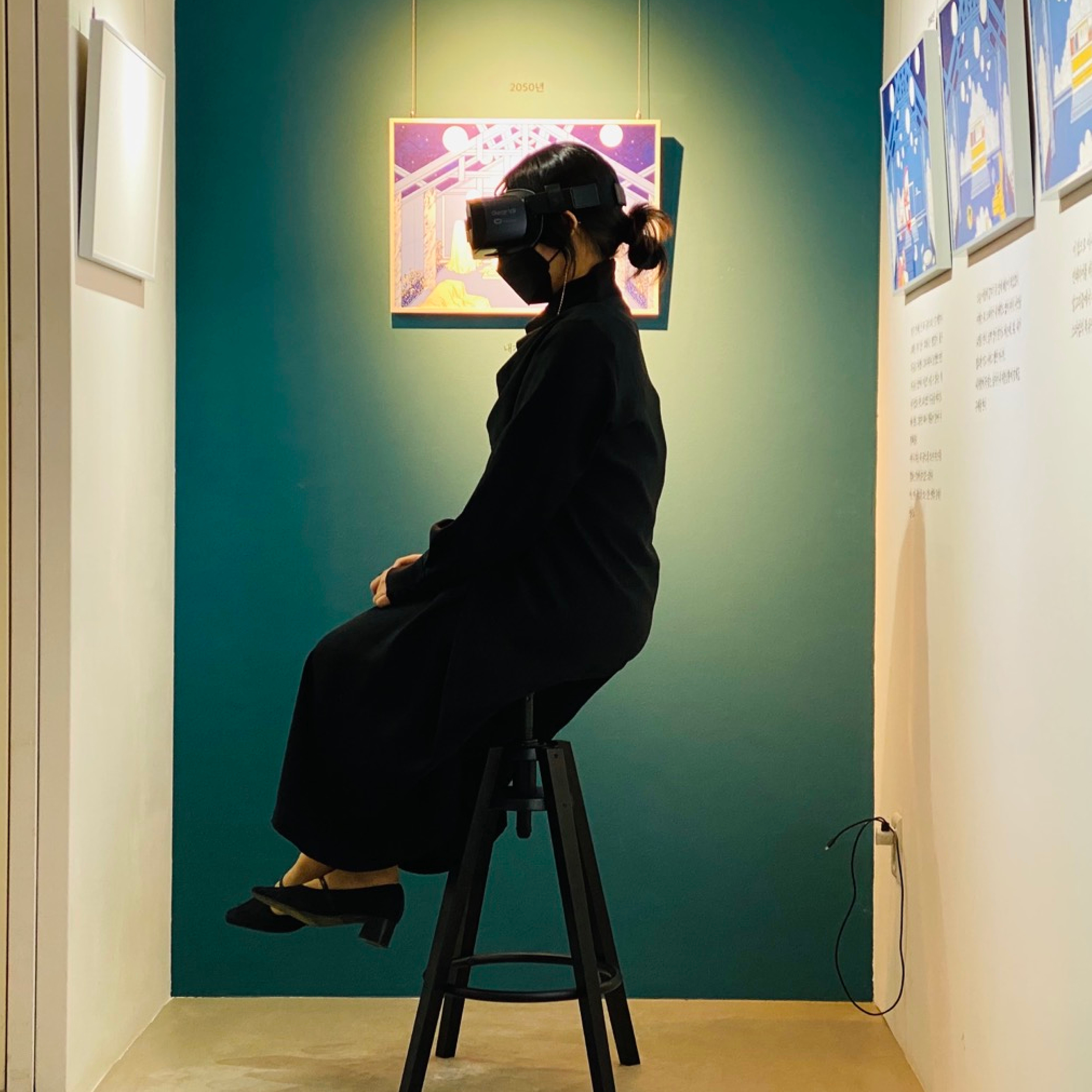 Through four distinct exhibits that use virtual reality (VR), interactive videos, and sculptures, youth can immerse themselves in the current and future impacts of AI technology.