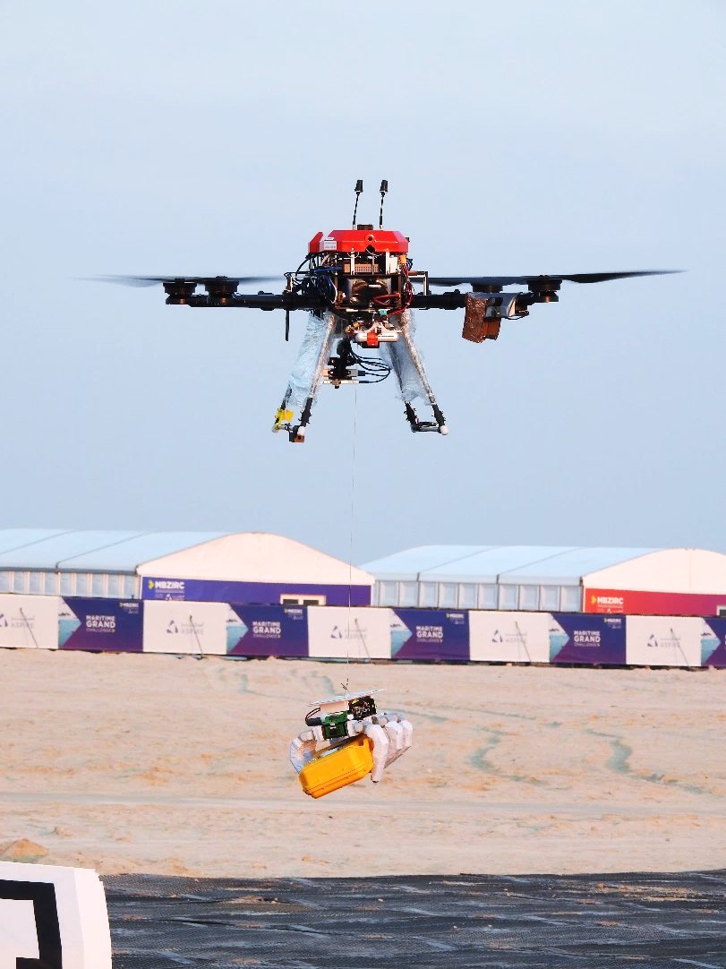 Figure 2. A drone using SPIBOT to retrieve objects